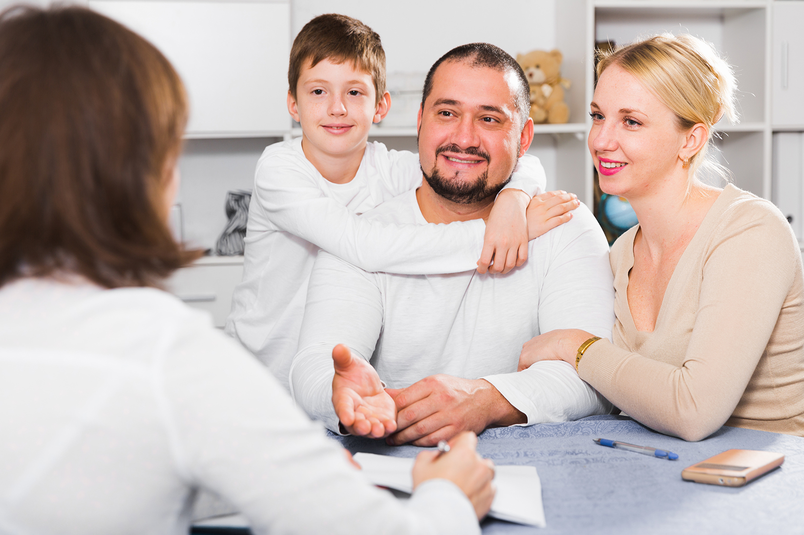 Parents of a young boy with Autism meet an allied health assistant for the first time